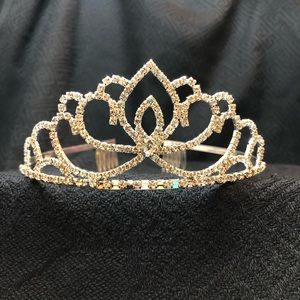 Silver color tiara with shiny crystals